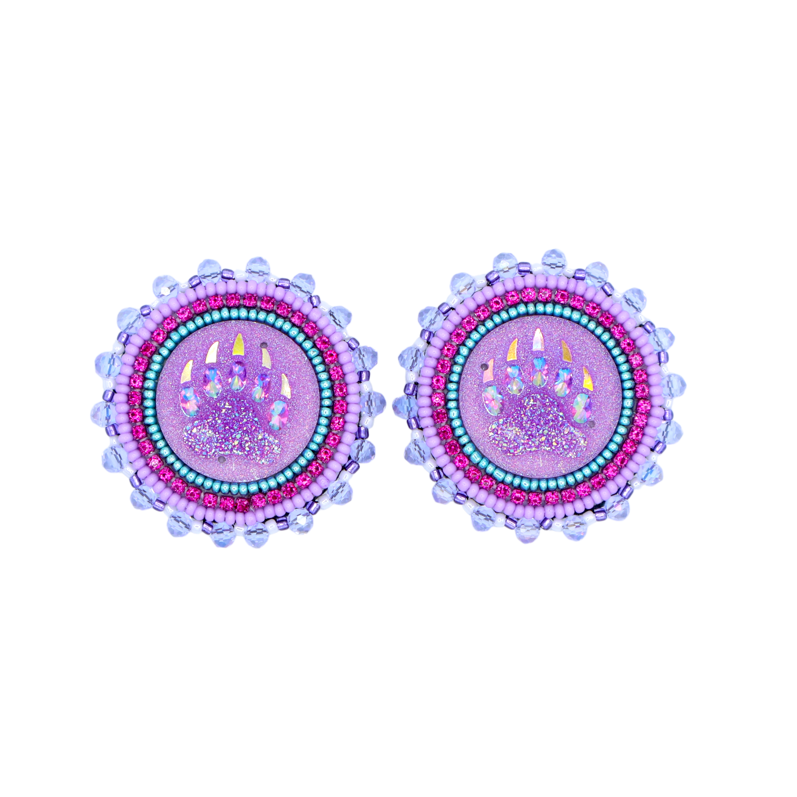 A pair of round stud earrings featuring a central purple glittery bear paw design surrounded by pink and turquoise beads, with light blue beaded outer edges, shown on a plain white background.