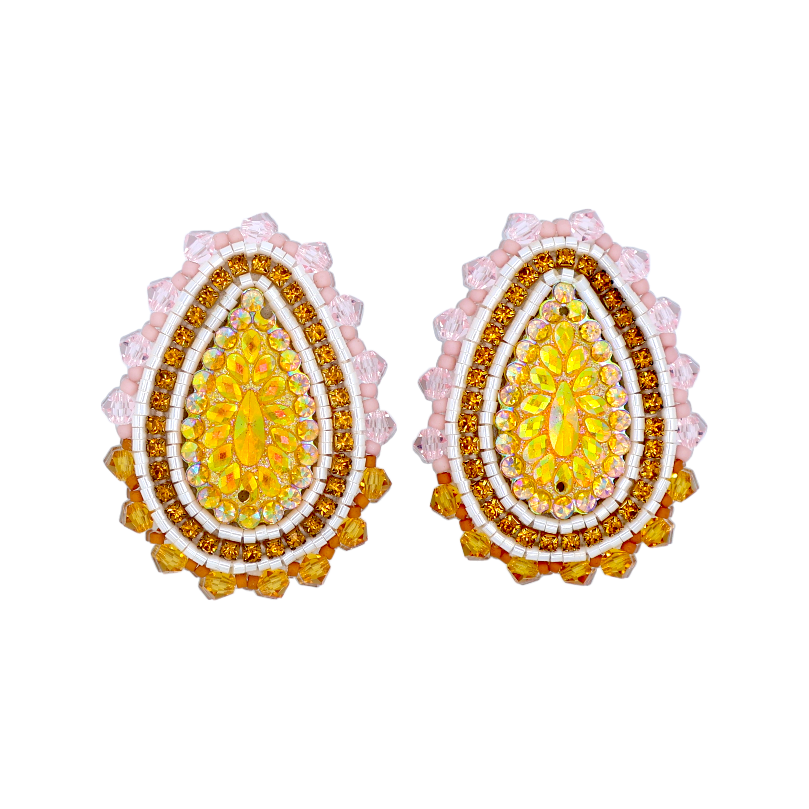A pair of ornate teardrop-shaped earrings with layered concentric designs in yellow, white, and metallic gold, accented by pink scalloped edges, shown on a plain white background.