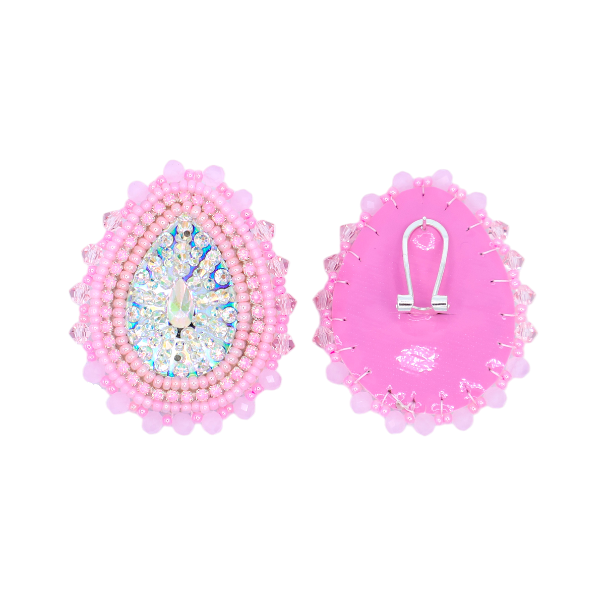 A pair of pink beaded teardrop-shaped brooches shown from the front and back. The front features a central clear rhinestone cluster surrounded by light blue and white beads, bordered by a ring of light pink beads.