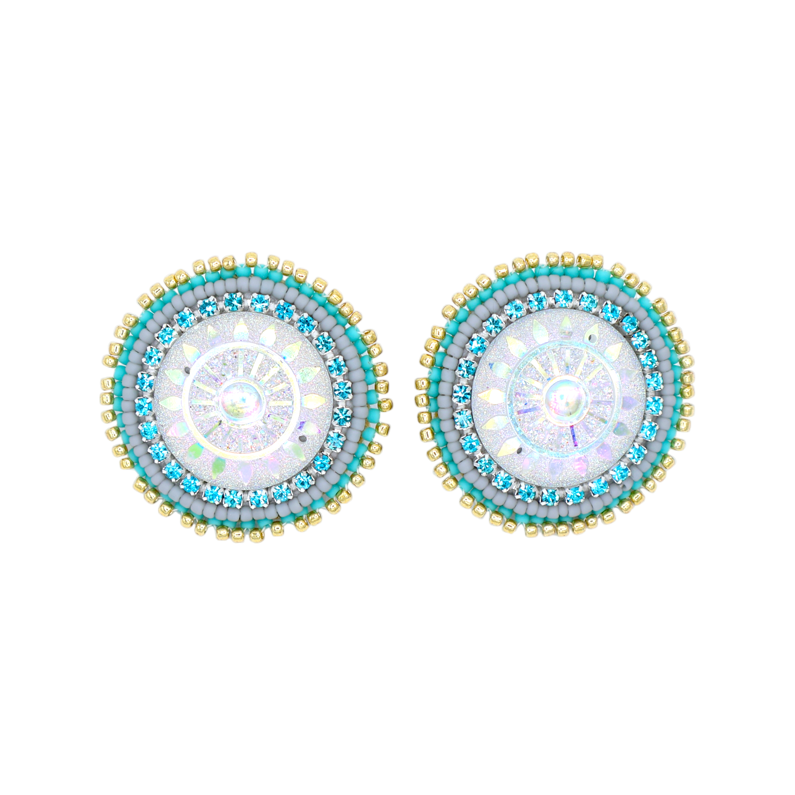 A pair of round beaded earrings with a white iridescent center, surrounded by concentric rings of light blue, turquoise, and gold seed beads, shown on a plain white background.