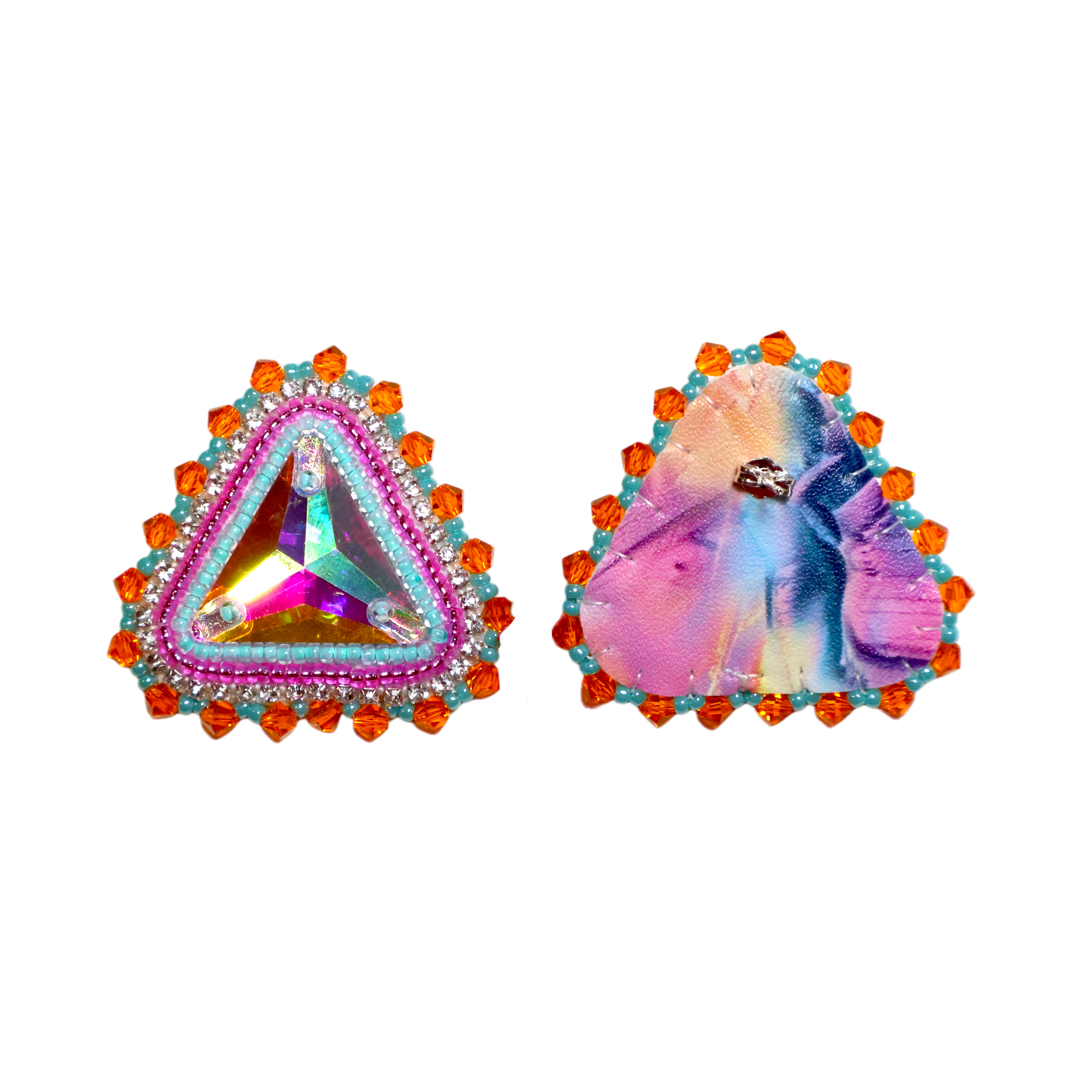 A pair of triangular stud earrings on a plain white background. One earring features a central iridescent triangle surrounded by pink rhinestones and orange crystal accents.